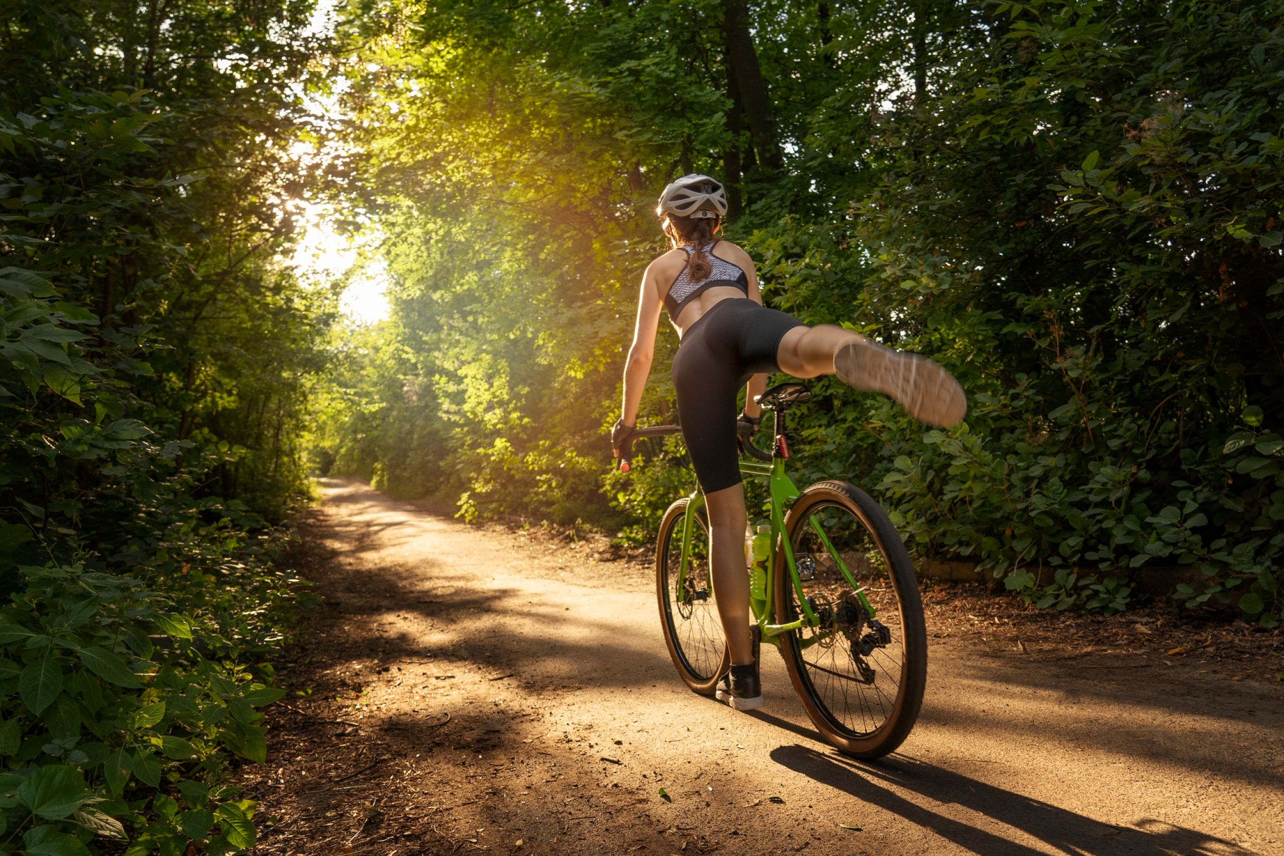girl on bike in forest